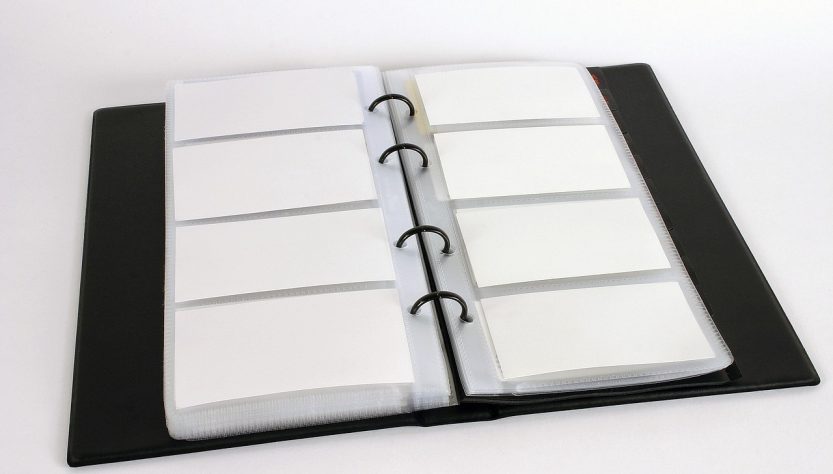Business card holder, business cards, workbook — Explore the Power of Blockchain with RXS Token Investments
